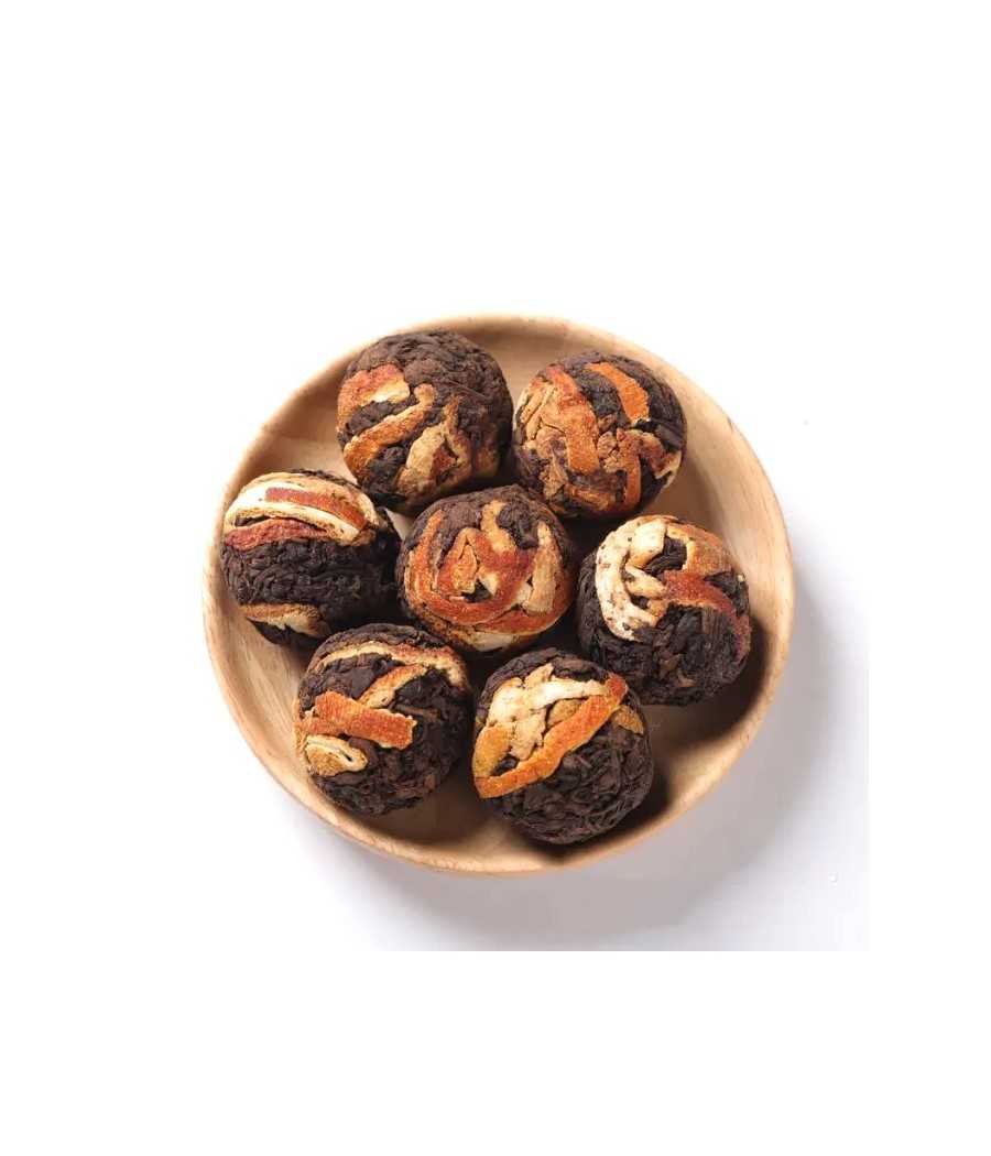 Black tea balls with orange bark